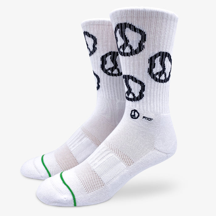 White peace sign socks. Made with soft combed cotton, extra arch support, air vents, and anti-microbial silver yarns. Still movin peace sign socks for any occasion.